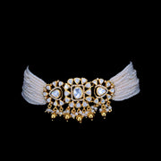 Polki piece enhanced with moti detailing.Chawker